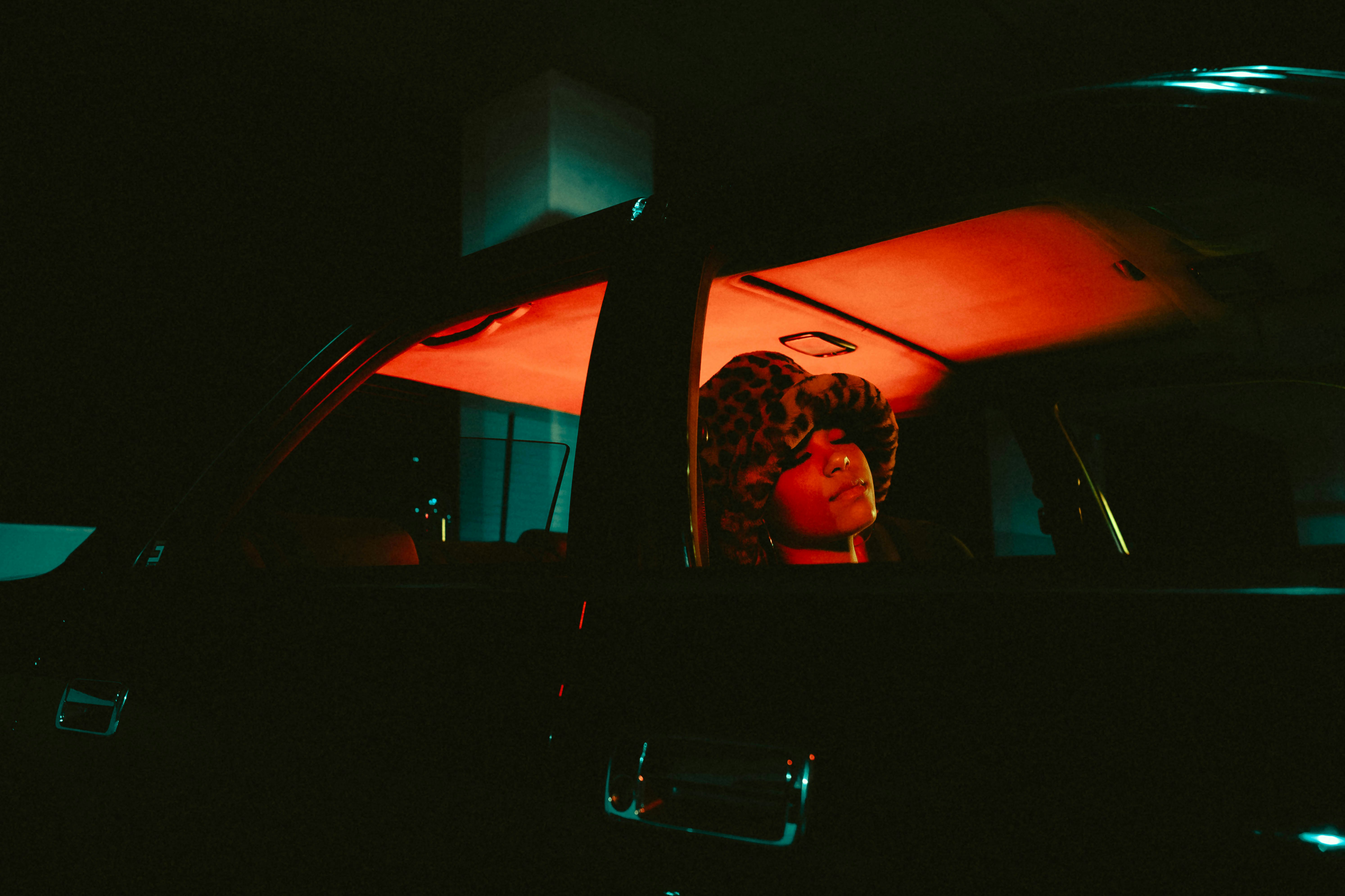 man in car taking selfie